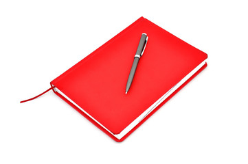 Red diary and pen