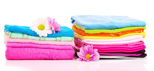 stacked colorful towels on a white background