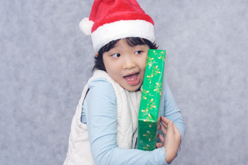 Happy kid with Christmas gift