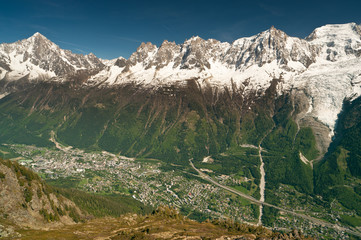 Chamonix town aerial view under mountains of Mont Blanc massif