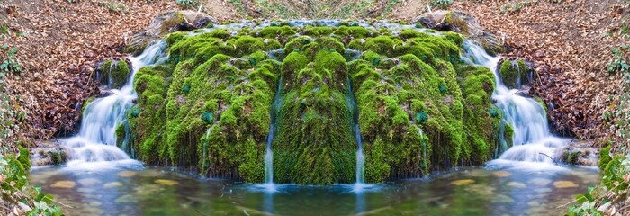 beautiful waterfall in a moss