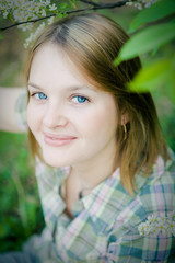 beautiful girl in spring garden