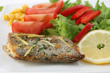 Fried swordfish with salad