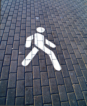 Pedestrian Zone Marked By White Man Sign
