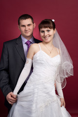 Couple newlyweds in wedding dress and suit