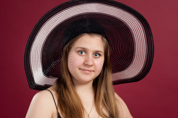 Portrait of girl in  hat  isolated