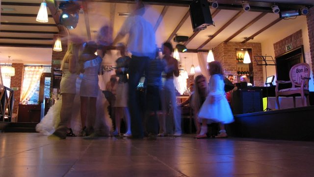 People dance at wedding party