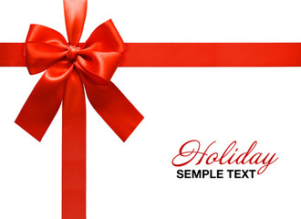 Big red holiday bow on white background