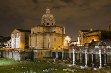 Fototapeta na wymiar Rome - Santi Luca e Martina church and Roman Forum at night