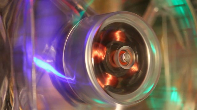 close-up shot of working computer mini fan with LED illumination