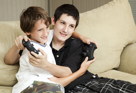 Brothers Playing Video Games