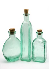 3 empty glass bottles