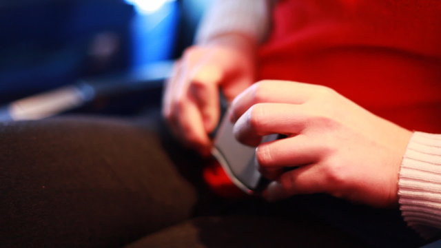 hands of girl sitting at passenger chair