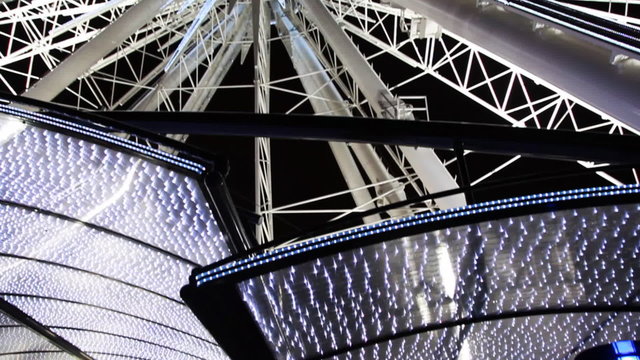 Lighted Ferris wheel by night