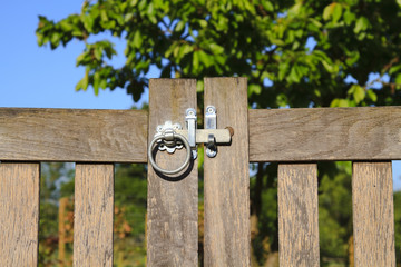 Closed latched wooden gate