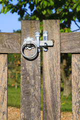Latched wooden gate in rural England
