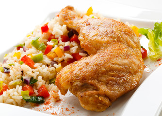 Roasted chicken leg, rice and vegetables
