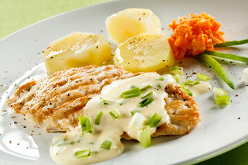 Grilled chicken breast and vegetables