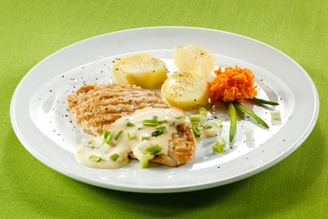 Grilled chicken breast and vegetables