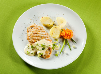 Grilled chicken breast and vegetables
