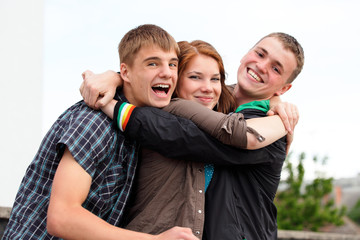 Fototapeta premium Portrait of three young teenagers
