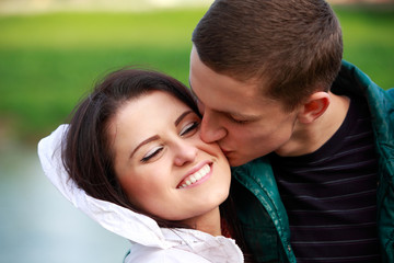 Fototapeta premium Portrait happy young teenage couple outdoor
