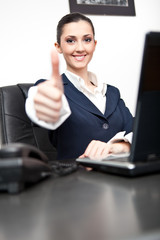 business woman with thumb up