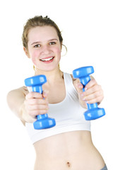 Fit active girl exercising with weights