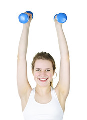 Fit active girl lifting weights for fitness