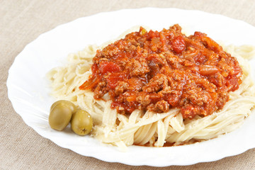 Italian cuisine. Pasta with meat sauce
