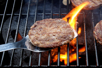 Sizzling Burgers On The BBQ