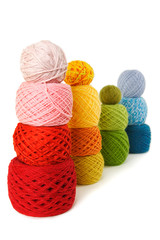 many multicolored clews in a vertical rows, isolated