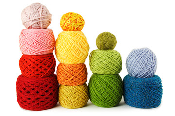many multicolored clews in a vertical rows, isolated