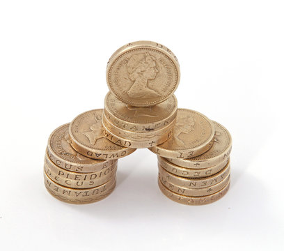 British, UK, pound coinsn on a plain white background.