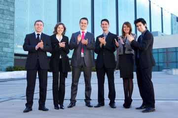 Fototapeta premium Six young business persons are celebrating their success