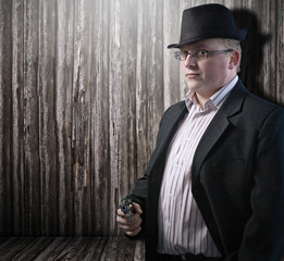 man with gun portrait