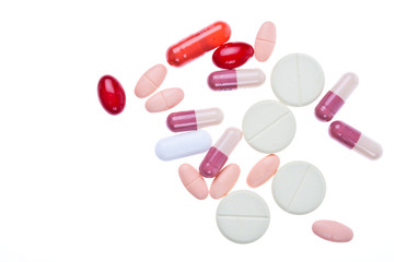 Colorful Medicine Tablets on White Background