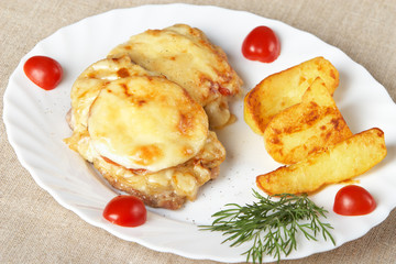 European cuisine. Meat in French with fried potatoes