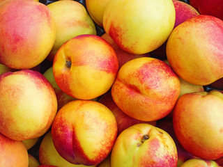 fresh ripe nectarines in the box ready for sale