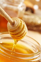 Honey with wood stick