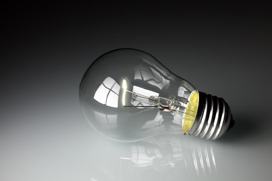 light bulb on grey background