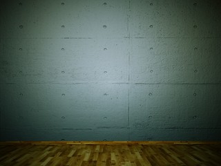 graue Betonwand mit Parkettboden