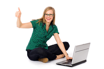 Girl with thumbs up using laptop
