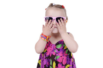 portrait of a sweet little girl in sunglasses