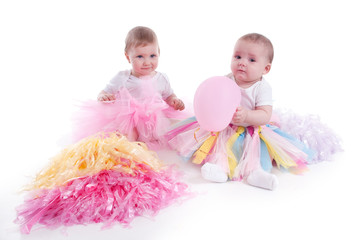 two kids on a white studio background