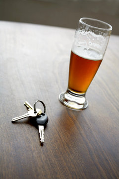Keys and beer. Drink driving idea