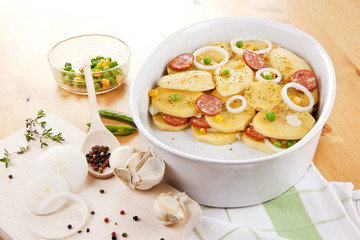 Baked potatoes in bowl.