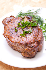 delicious fried steak with herbs