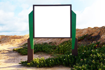 White wood information placard on a desert landscape