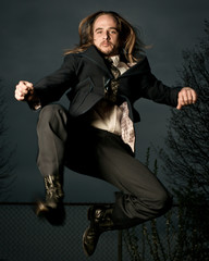 Man in Suit Jumping